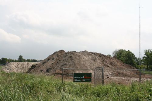 De werkzaamheden in de rotondedriehoek bij N33-Industrieweg, het gebied waar onderaannemer Oosterhof-Holman de scepter zwaait, zijn voor deze week afgerond. De bulten zijn weeekendbestendig...